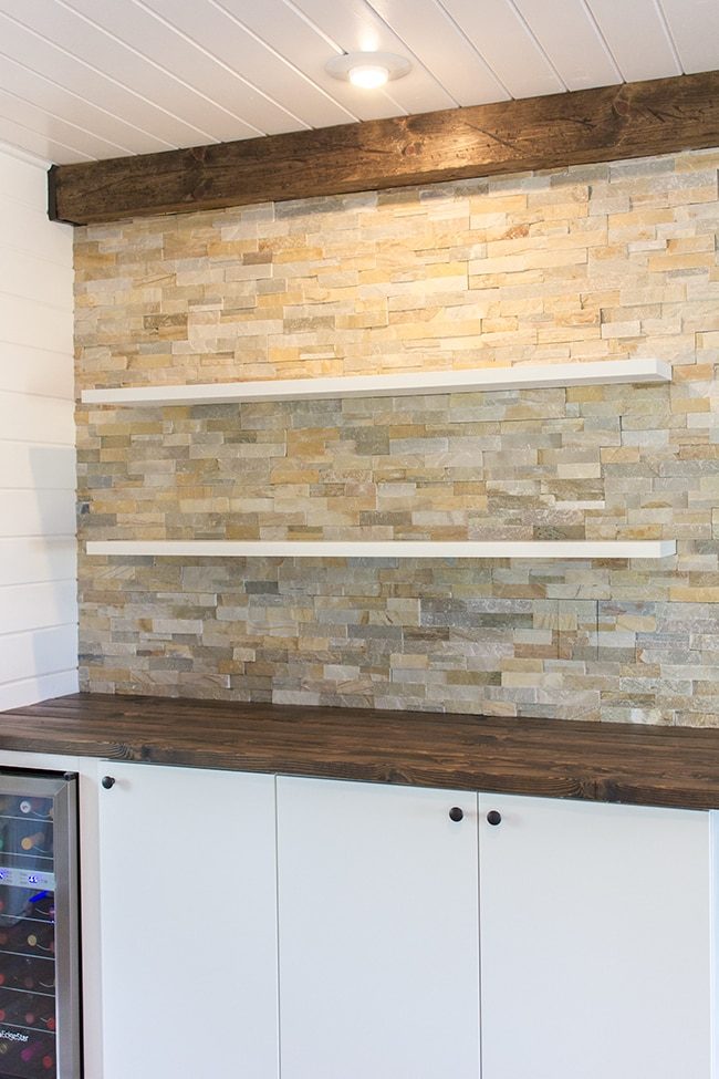 diy custom shelves on a desert quartz ledgestone wall
