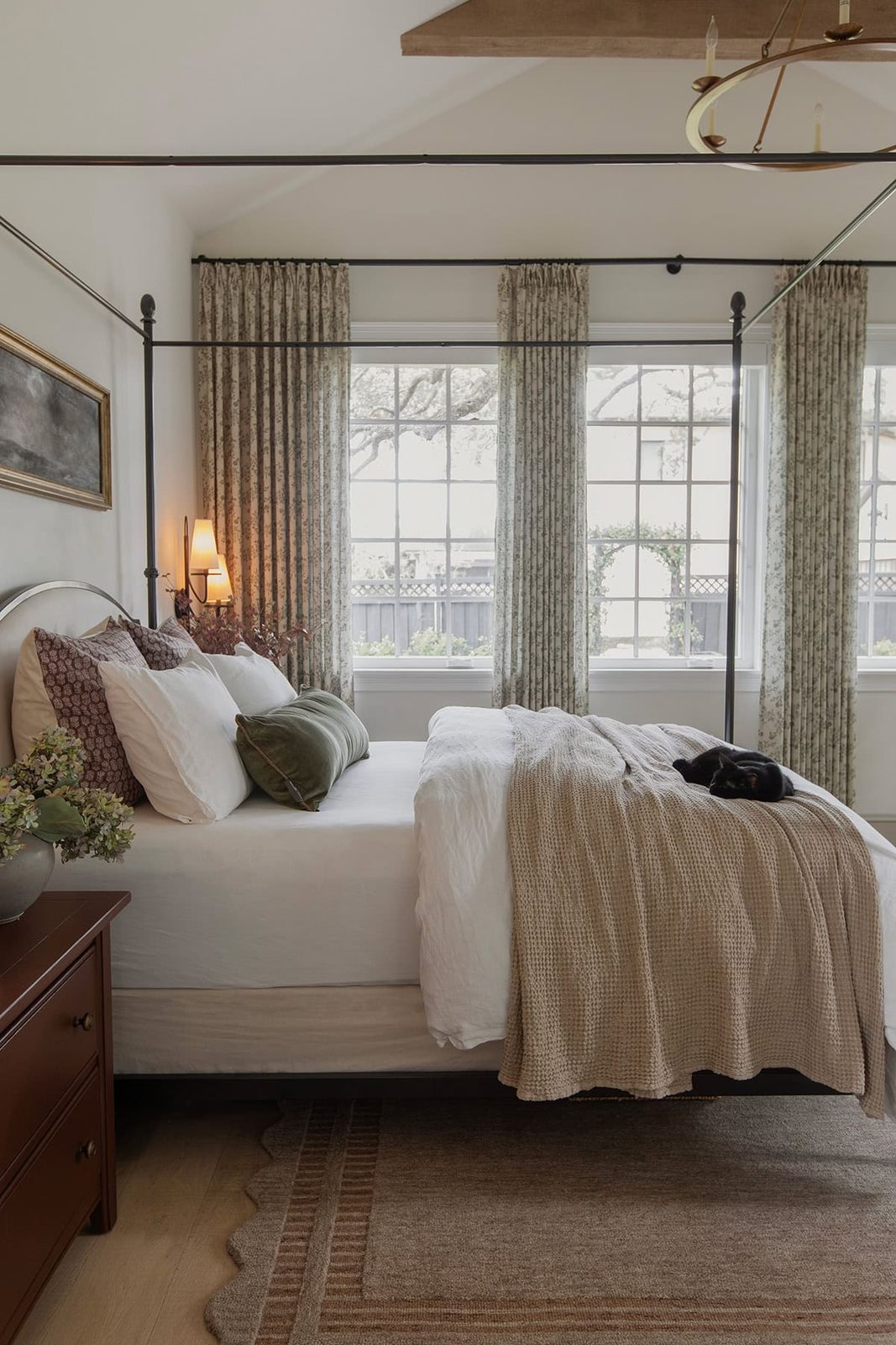 master bedroom with loloi scottie rug, twopages sarale curtains, canopy bed
