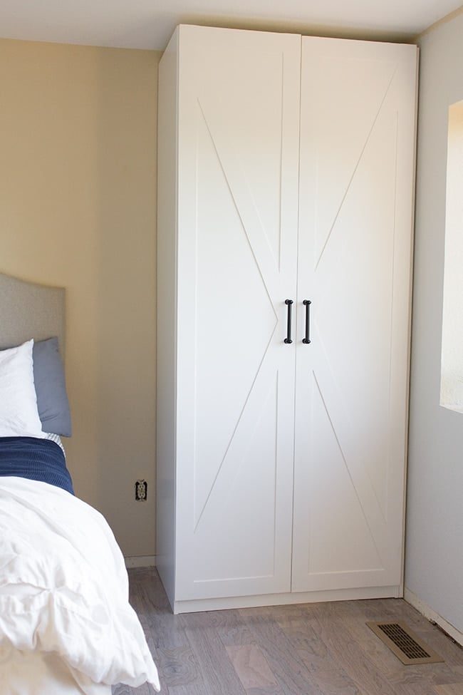 built-in ikea pax wardrobe with custom doors