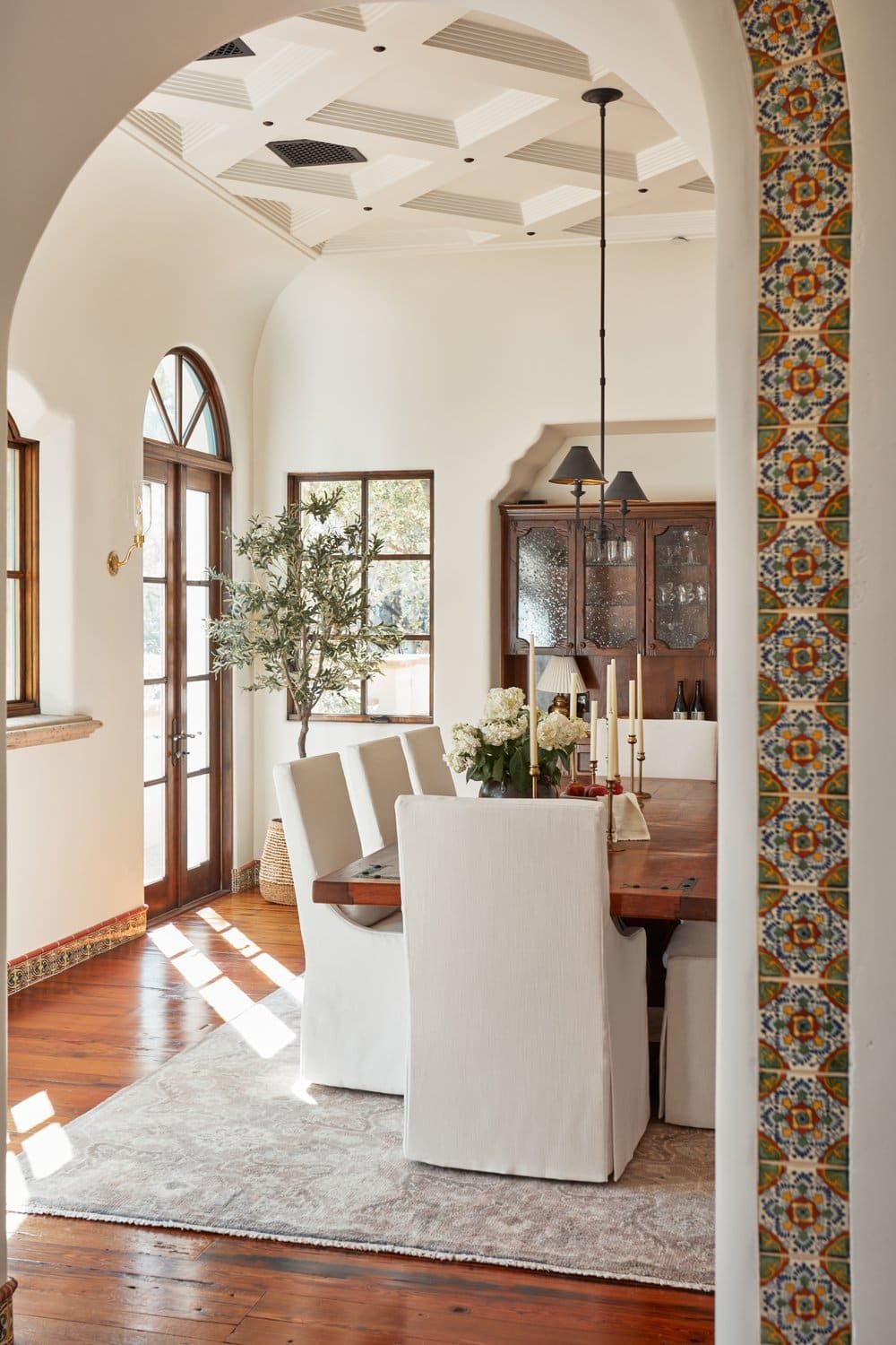 spanish style dining room with accent tile