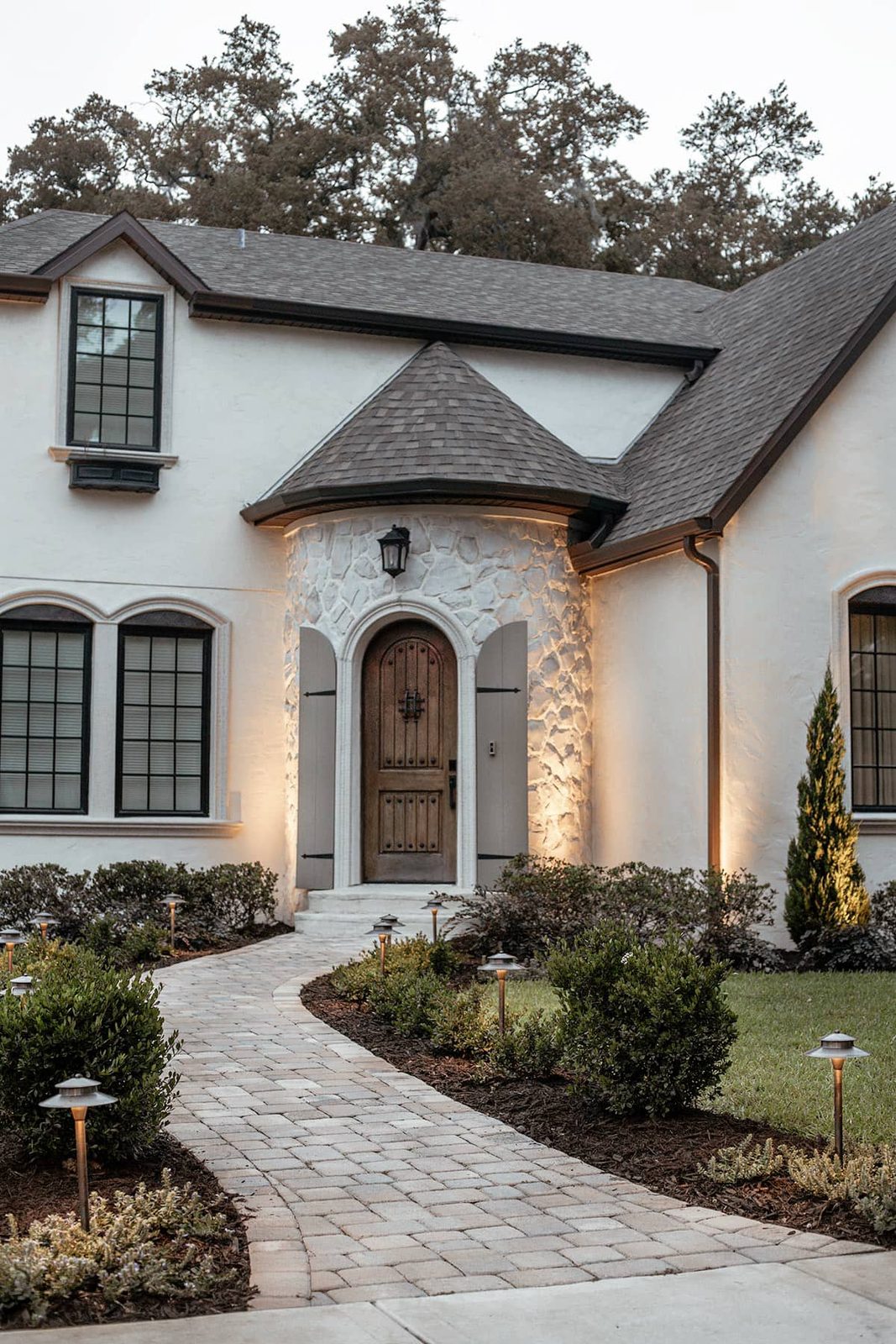 french country cottage stone turret front door