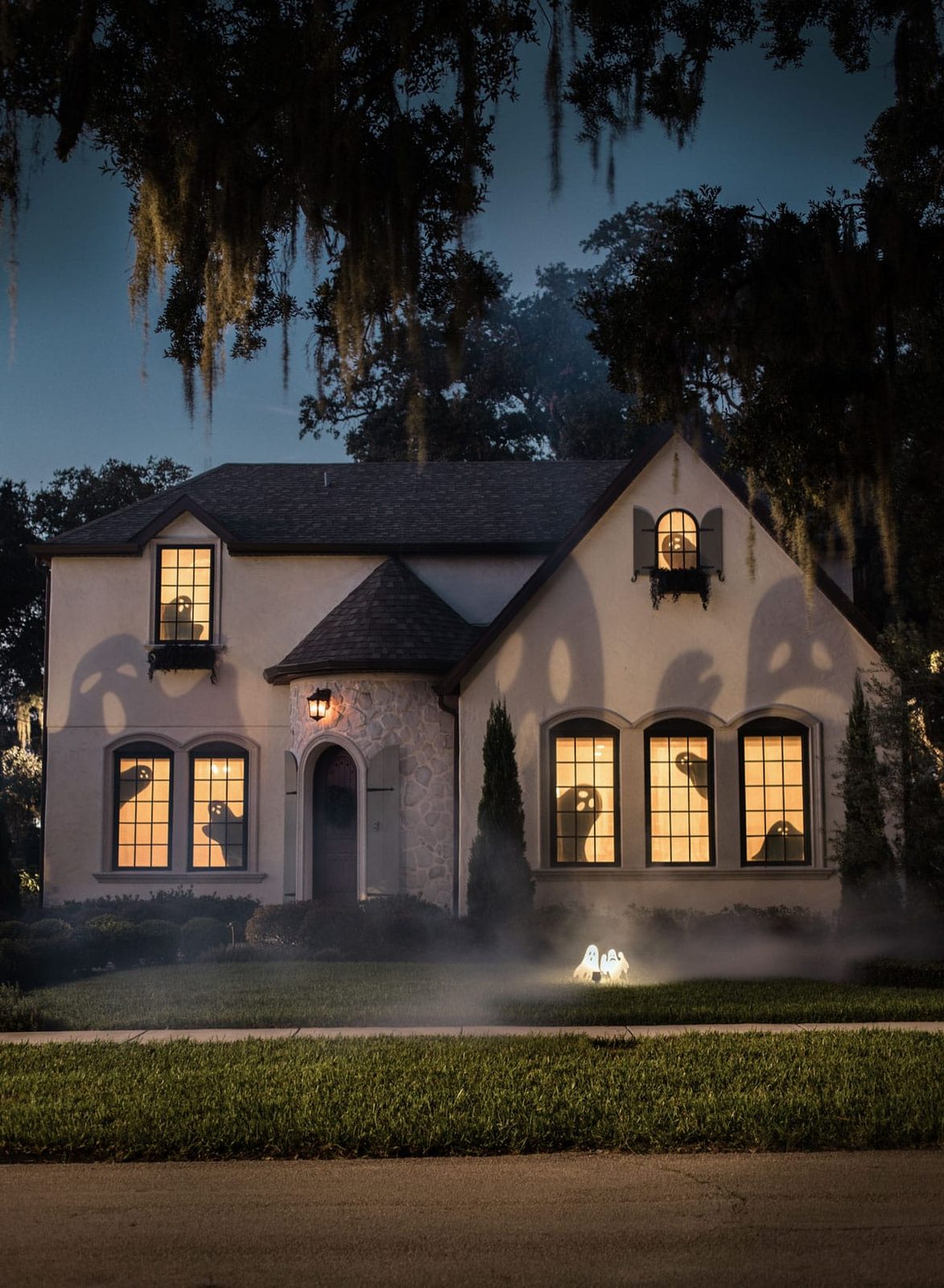 halloween exterior decor with ghost shadows