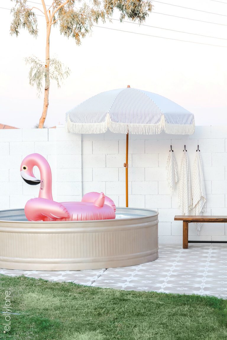 custom painted stock tank pool in desert backyard