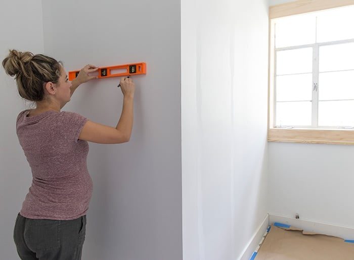drawing a horizontal line along the wall