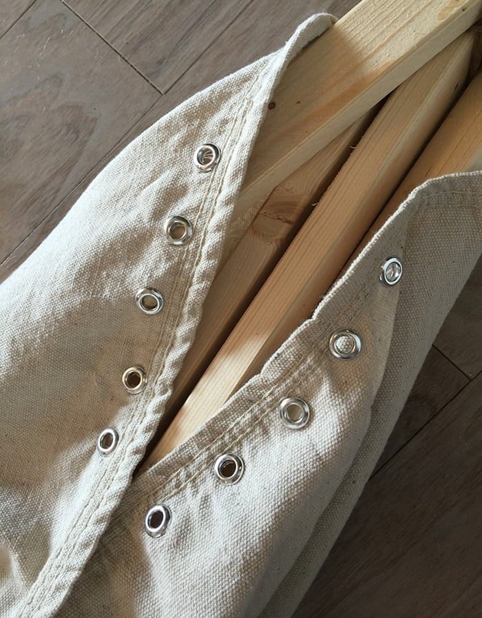 Step by step tutorial on how to make a unfussy, no sew dropcloth teepee for around $20!